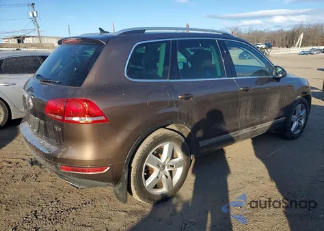 2012 Volkswagen Touareg V6 z USA, uszkodzony, nr VIN WVGFF9BP7CD001968